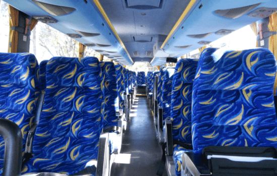 Blue reclining coach seats in a touring coach Johannesburg